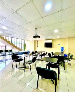 TV a/nebo společenská místnost v ubytování Hotel Blu Bascuñan