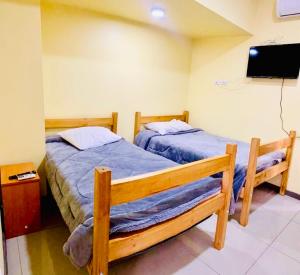 Postel nebo postele na pokoji v ubytování Hotel Blu Bascuñan + 37 fotografií