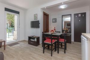 TV a/nebo společenská místnost v ubytování Apartment Dea