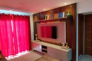 Μια τηλεόραση ή/και κέντρο ψυχαγωγίας στο Residencial Parque Douat