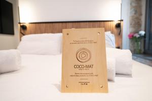 Postel nebo postele na pokoji v ubytování Cardamilia Suites