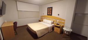 A bed or beds in a room at HOTEL Javier Prado Inn