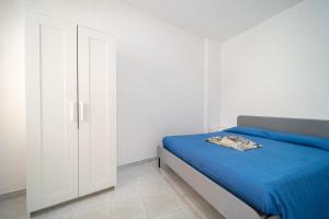 Ένα ή περισσότερα κρεβάτια σε δωμάτιο στο Vista mare incantevole