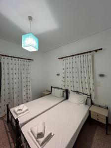 Galini Hotel Bed and Breakfast客房内的一张或多张床位