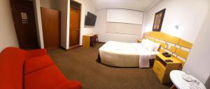 A bed or beds in a room at HOTEL Javier Prado Inn