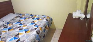 Postel nebo postele na pokoji v ubytování Hotel Ideal, Your House in Quetzaltenango