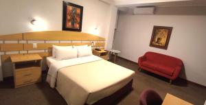 A bed or beds in a room at HOTEL Javier Prado Inn