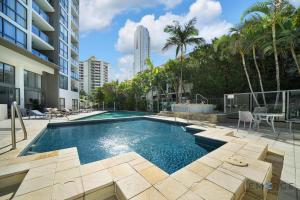 a swimming pool in the middle of a building at Ipanema Holiday Resort in Gold Coast
