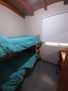 Katil atau katil-katil dalam bilik di Departamento Los Girasoles +1 gambar