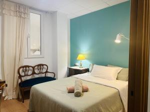 Postel nebo postele na pokoji v ubytování Mirador 1 del Mercado Central - habitacion con baño privado en el centro de la Ciudad Vella