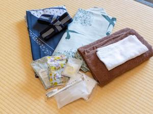 a pile of items on top of a table at Kiso Mikawaya in Kiso