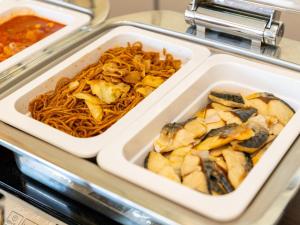 two styrofoam containers filled with noodles and seafood at Kiso Mikawaya in Kiso