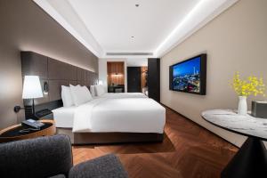 Voodi või voodid majutusasutuse IntercityHotel Shenzhen Bay -Free laundry & Free MiniBar toas