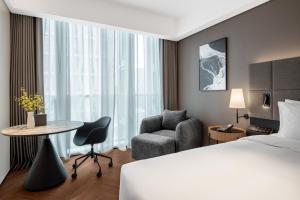Voodi või voodid majutusasutuse IntercityHotel Shenzhen Bay -Free laundry & Free MiniBar toas