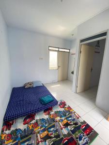 Voodi või voodid majutusasutuse TERAS DAMAI HOMESTAY toas