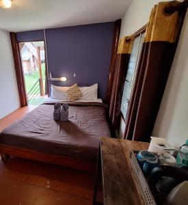 Postel nebo postele na pokoji v ubytování Sleep Pai Bed & Breakfast