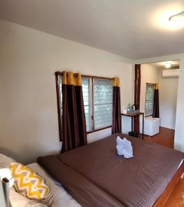 Postel nebo postele na pokoji v ubytování Sleep Pai Bed & Breakfast