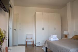 Postel nebo postele na pokoji v ubytování B&B Santa Filomena
