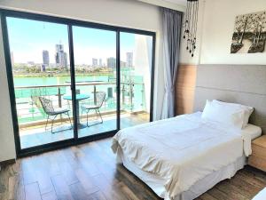 Ένα ή περισσότερα κρεβάτια σε δωμάτιο στο CHILCHILL Hotel Riverside