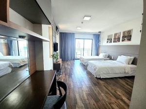 Ένα ή περισσότερα κρεβάτια σε δωμάτιο στο CHILCHILL Hotel Riverside