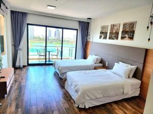 Ένα ή περισσότερα κρεβάτια σε δωμάτιο στο CHILCHILL Hotel Riverside