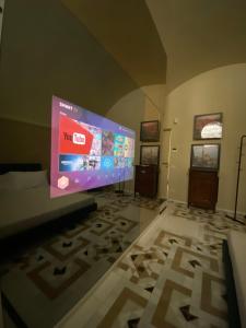 TV a/nebo společenská místnost v ubytování La dimora di Don Antonio