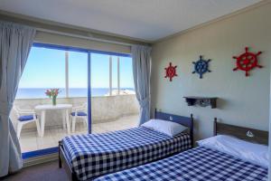 Katil atau katil-katil dalam bilik di MR Mar Suites (ex Neruda Mar Suites)