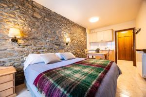 Postel nebo postele na pokoji v ubytování Aparthotel les Corts + 25 fotografií