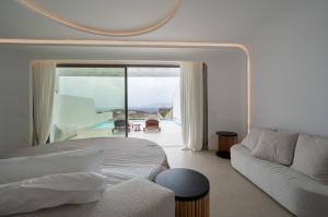 Posezení v ubytování Muse οf Mykonos Luxury Suites
