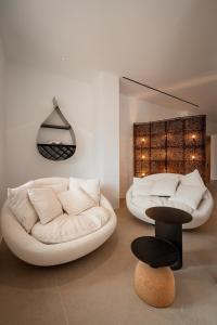 Posezení v ubytování Muse οf Mykonos Luxury Suites
