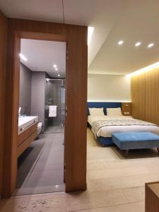 Voodi või voodid majutusasutuse Monot Suites toas
