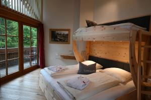 Posteľ alebo postele v izbe v ubytovaní Apartment Sonnenspitze + 8 fotografií