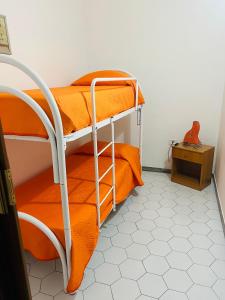 Postel nebo postele na pokoji v ubytování Casa Mariangela