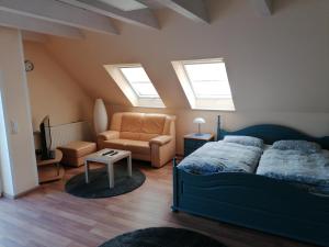 Χώρος καθιστικού στο Großzügiges Wohnstudio mit Balkon und Badbenutzung +1 φωτογραφίες