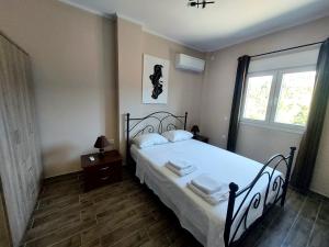 Postel nebo postele na pokoji v ubytování Arianas apartment