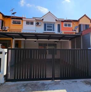 a house with a black gate in front of it at IKEA Modernism House 10Pax`Near Icon City in Bukit Mertajam