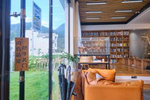 منطقة جلوس في Nature Cure Village Lodge-婺源自在舍