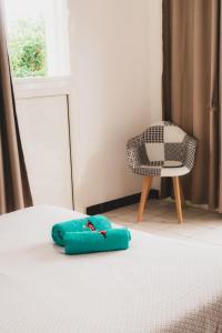 Letto o letti in una camera di L’Étoile du Sud