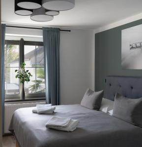 Voodi või voodid majutusasutuse KRACHER Apartment No 1 - inklusive Pool toas