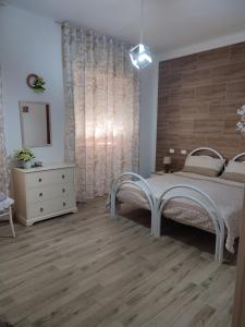 A bed or beds in a room at Monte Granatico