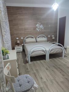 A bed or beds in a room at Monte Granatico