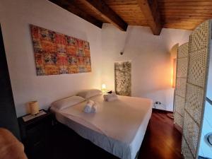 Postel nebo postele na pokoji v ubytování Relax apartment - Ortigia Holidays