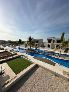 Πισίνα στο ή κοντά στο Private Studio in Laguna Gardens Hawana Salalah