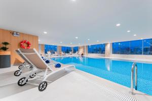 Bazén v ubytování Corp Yanbu Hotel فندق كورب ينبع nebo v jeho okolí