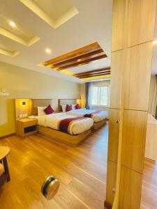 Ένα ή περισσότερα κρεβάτια σε δωμάτιο στο Hotel Aerocity