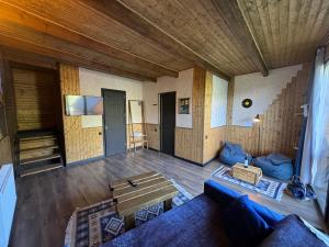 Postel nebo postele na pokoji v ubytování Checkin Kazbegi