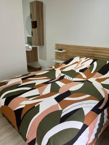 Postel nebo postele na pokoji v ubytování La maison des hôtes