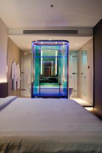 Letto o letti in una camera di CapsuleTransit MAX - Airport Hotel - Landside, Public Area - Gateway KLIA T2, Lvl 2M