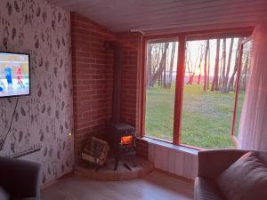 Televisi dan/atau pusat hiburan di sun& relax- TINYHOUSE