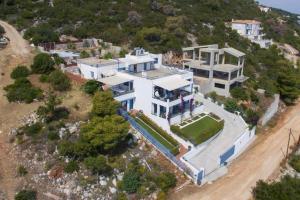 an aerial view of a large white house at White-Blue Luxury Villa 2 in Pefkali